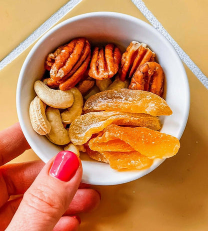 dried peach fruit and nut snack bowl